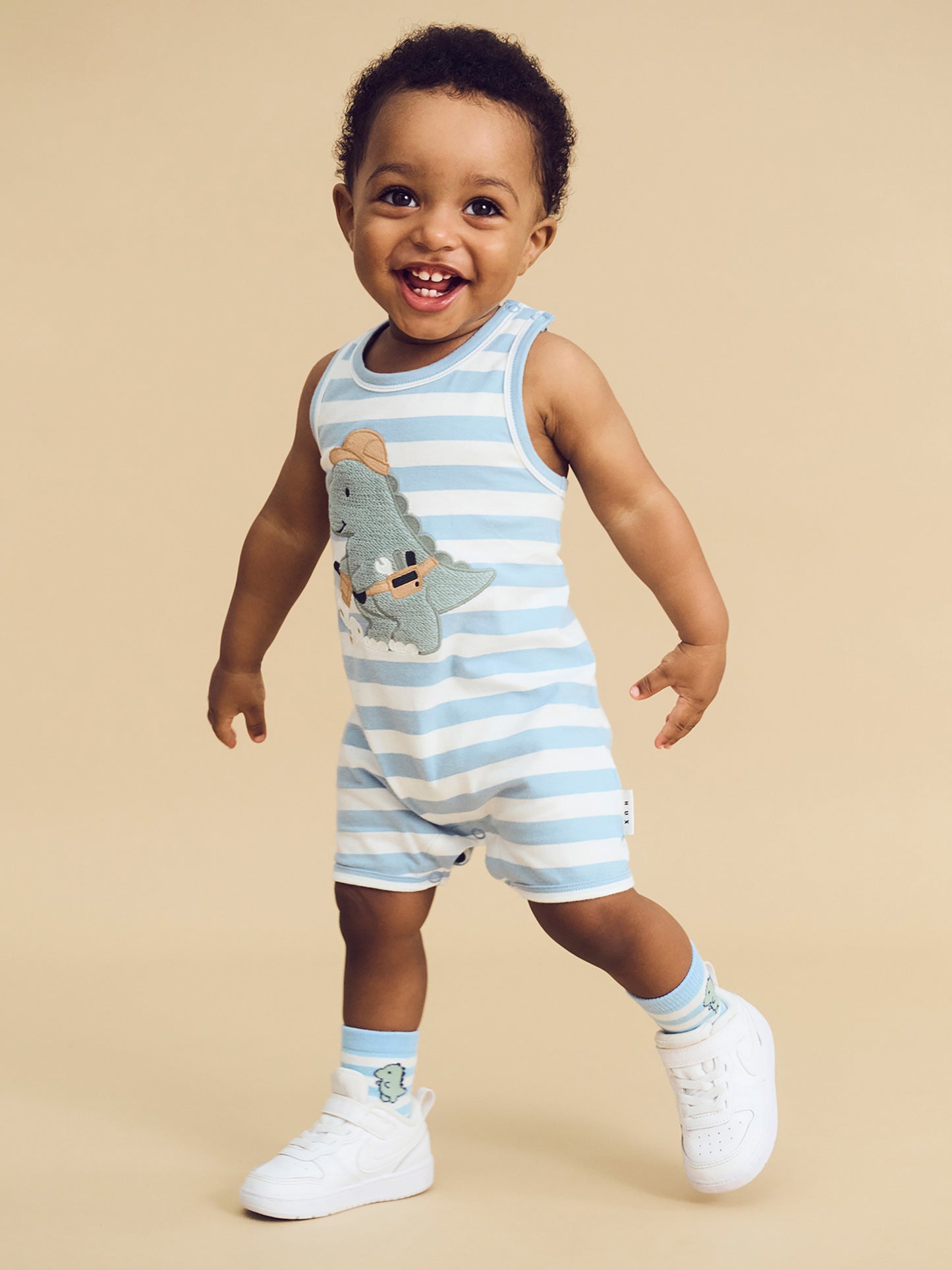 Huxbaby Construction Dino Stripe Sleeveless Romper Marine Blue/Almond Milk